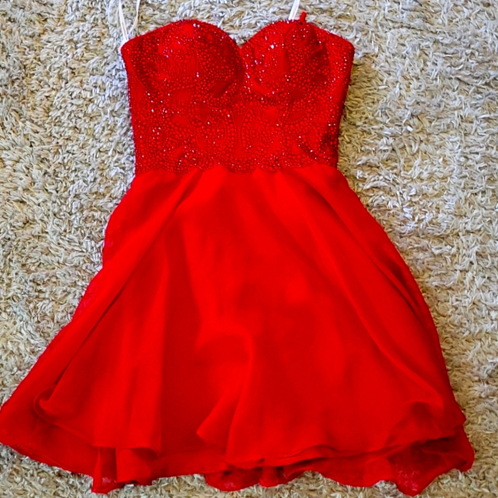 Alyce Paris sleeveless red beaded mini dress.